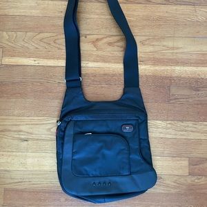 Black Tumi cross body bag